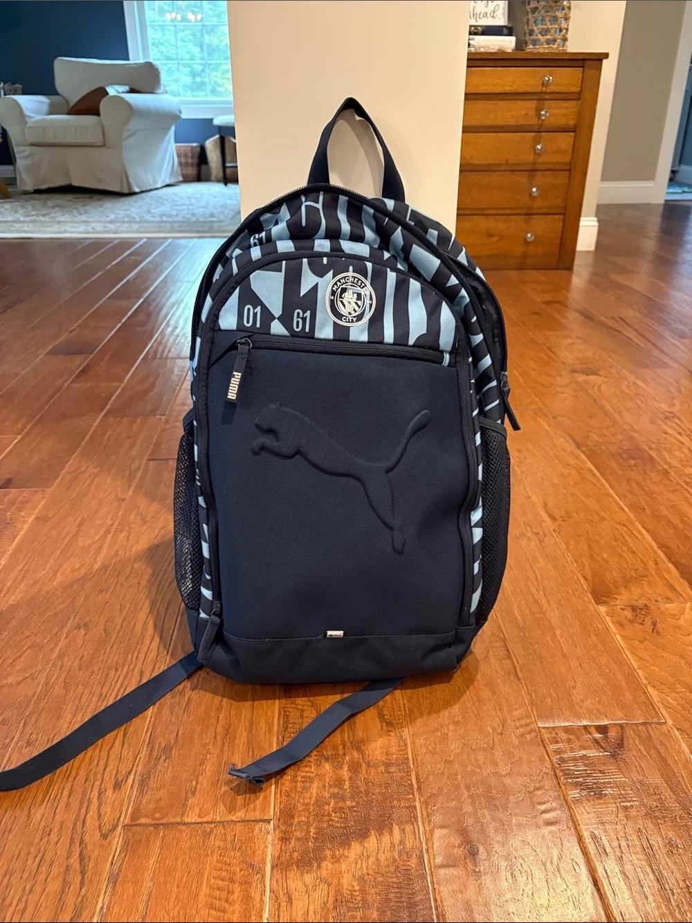 Puma Manchester City Black and Light Blue Striped Logo Backpack